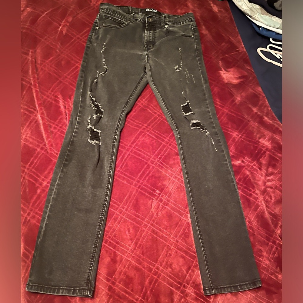 True Luck distressed skinny jeans.